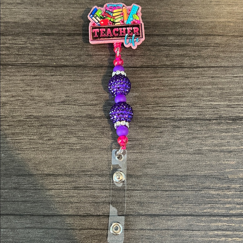 Teacher badge reel